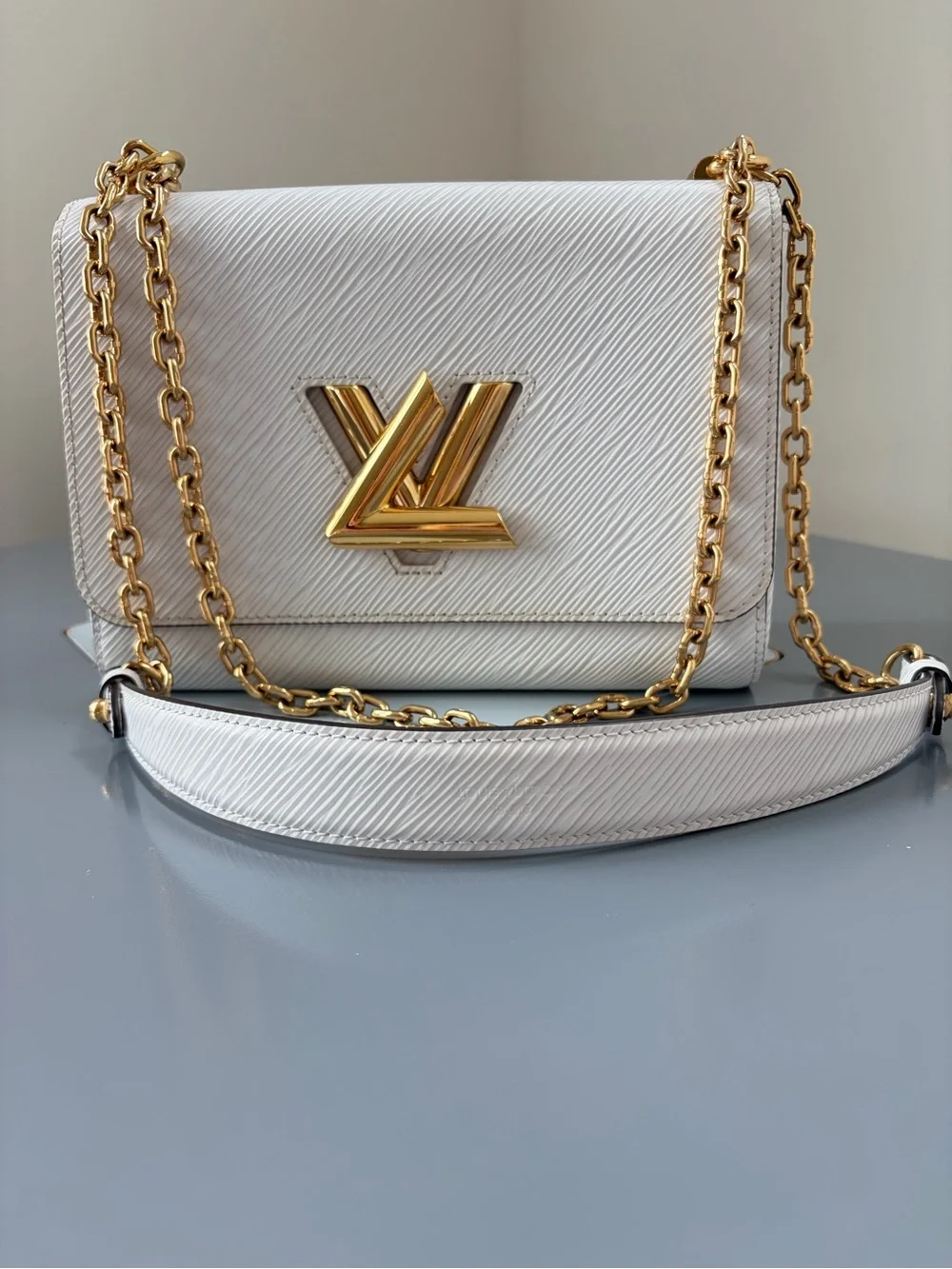 Louis Vuitton White Crossbody Bag with Gold Chain and LV Logo